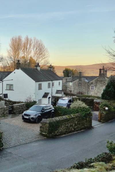 house with hills in the distance